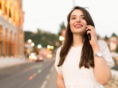 Young charming woman talking on the phone